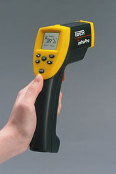 Figure 1: With an IR thermometer, the user points the instrument at the object and pulls the trigger to display the temperature.